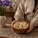آجیل چهار مغز خام روستاژ کنار گلدان زنبق